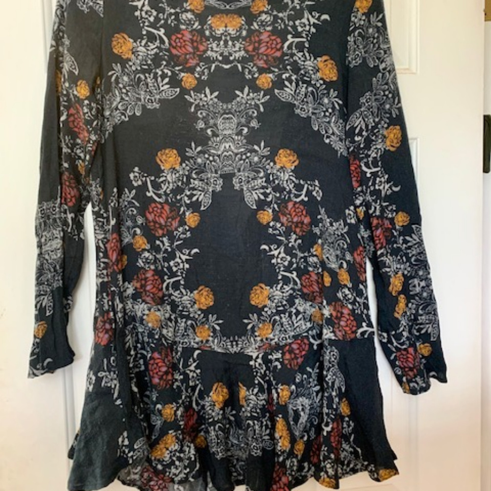 Free People black long sleeve dress with open back